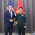 Deputy Prime Minister and Minister of National Defence Gen. Phan Van Giang (R) and US Secretary of War Pete Hegseth (Photo: qdnd.vn)