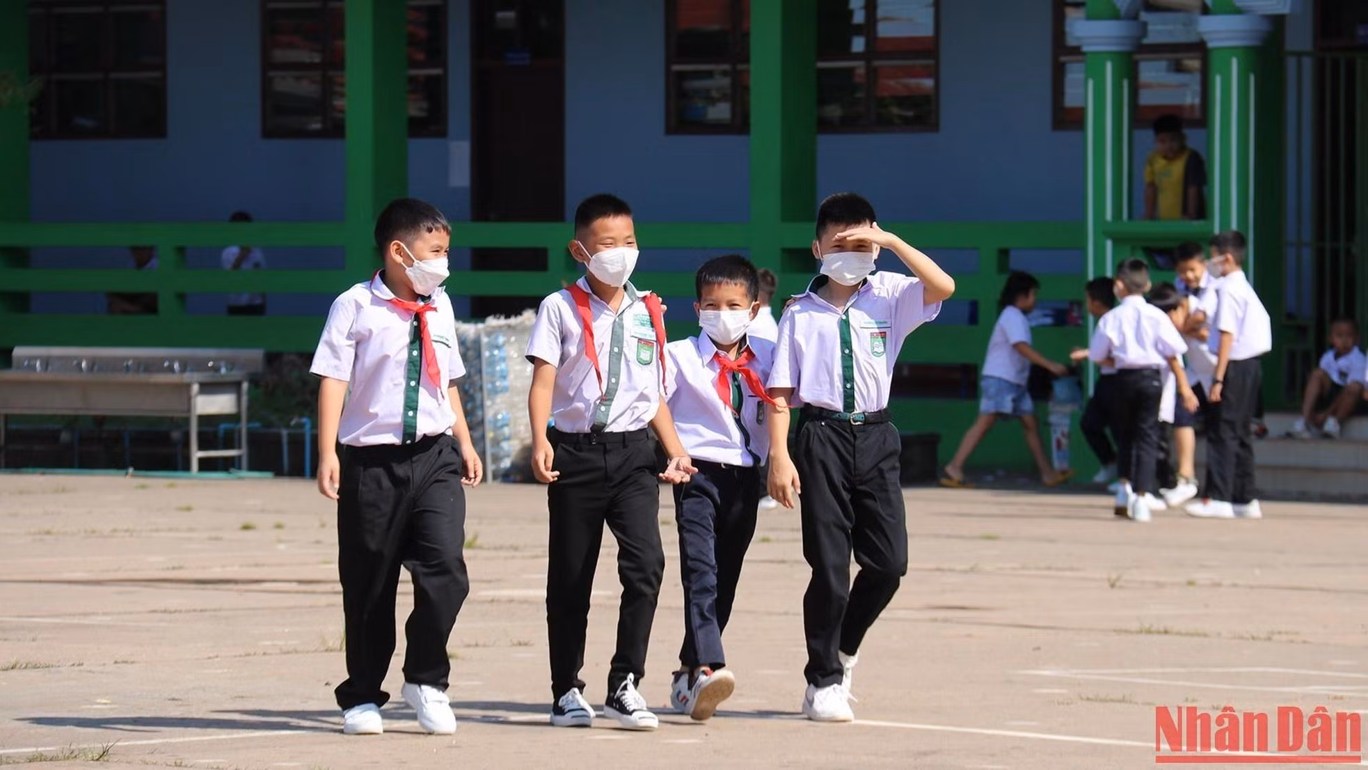 At recess, the students went down to the school yard to relax.