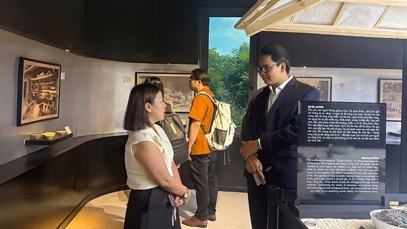 Visitors explore the Pho Museum. (Photo: HOANG TUYET)