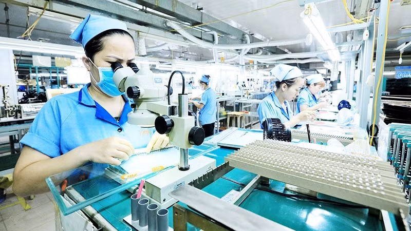 Rhythm Vietnam Co., Ltd. (Hanoi), a Japanese enterprise specialising in precision components, moulds and electronic circuit boards. Photo: THANH DAT