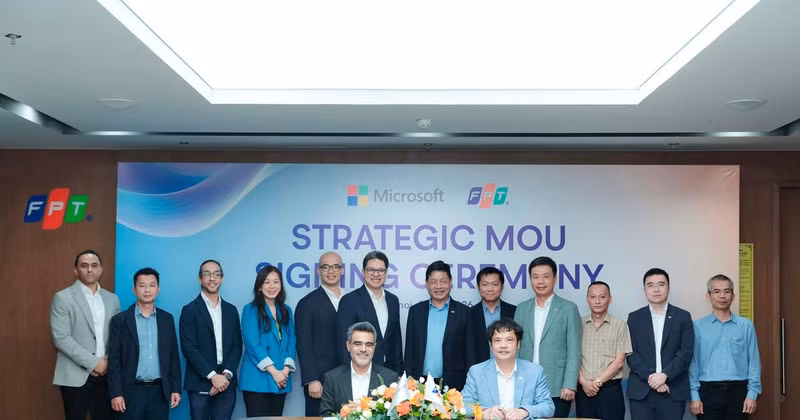 Representatives of FPT and Microsoft at the signing ceremony for a cooperation agreement aimed at promoting AI adoption and innovation across Asia, with a focus on ASEAN, Japan, and the Republic of Korea (RoK).