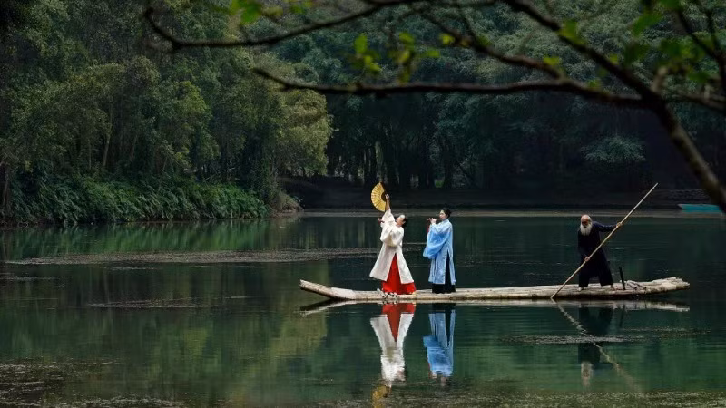 Traditional Vietnamese costumes presented by Hoa Lu Legacy on the Ngo Dong River, Ninh Binh.