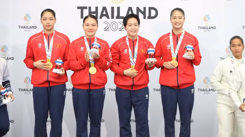 Nguyen Thi Phuong, Nguyen Ngoc Tram, Bui Ngoc Nhi, and Hoang Thi Thu Uyen win the gold medal in the women’s team kata event in Karate.