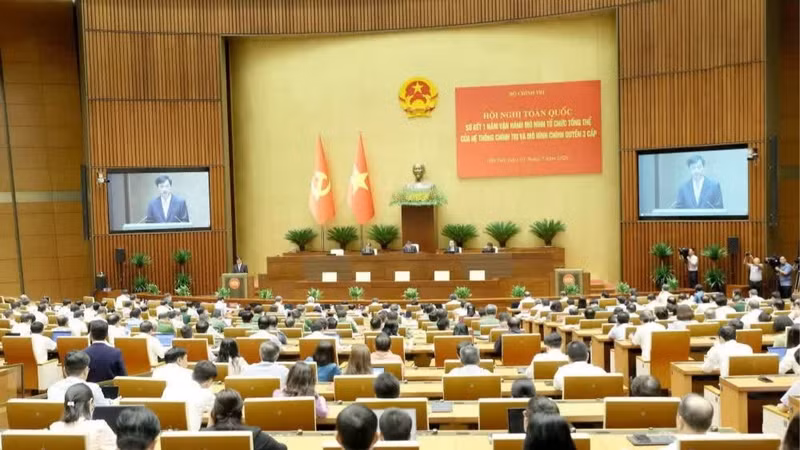 The conference reviews the one-year implementation of the overall organisational model of the political system and the three-tier administration model. (Photo: VNA)