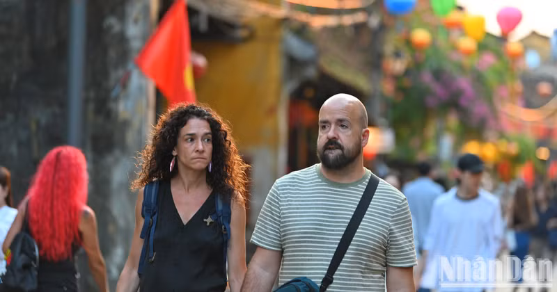 International visitors explore Hoi An Ancient Town, one of Viet Nam’s most popular tourist destinations. (Photo: THE DAI)