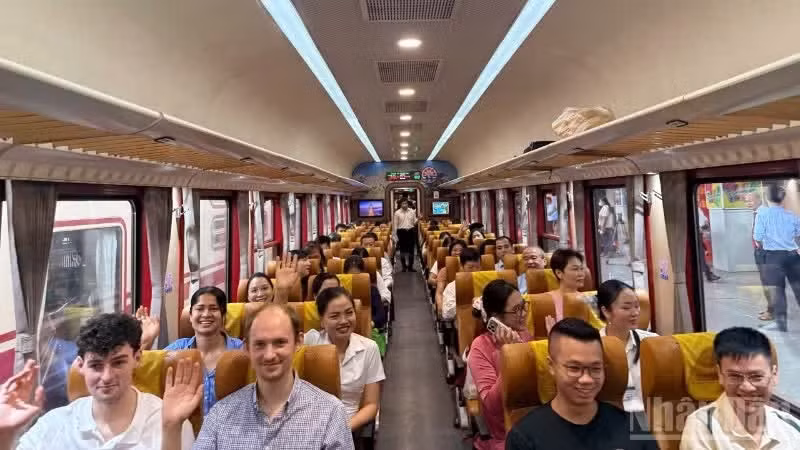 Medical staff and doctors from Bach Mai Hospital on the first train journey from Ha Noi to Phu Ly (Ninh Binh).