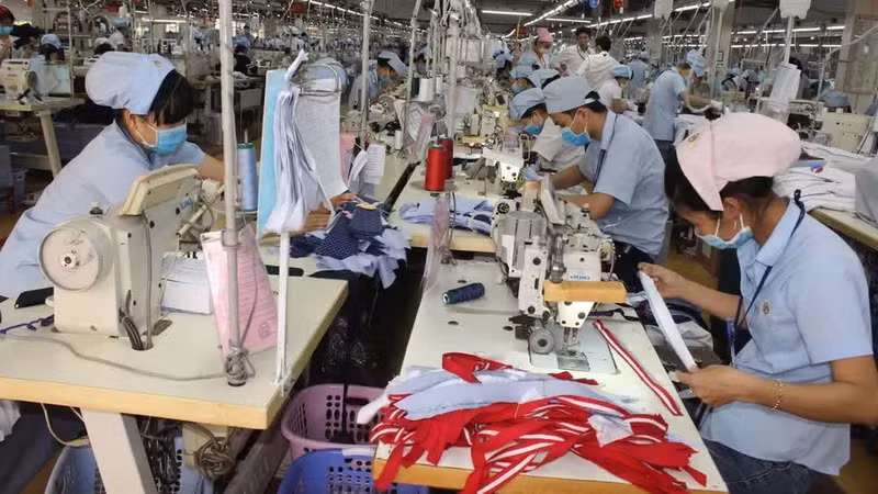 Garment production for export at Binh Duong Garment Joint Stock Company.