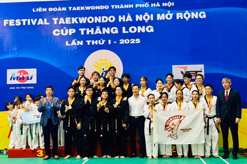 Martial artists receive prizes at the closing ceremony.