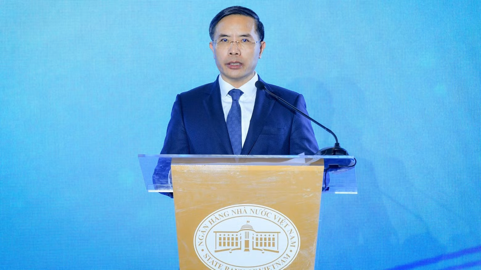 Governor of the State Bank of Viet Nam Pham Duc An delivers his remarks. (Photo: VIET PHONG)
