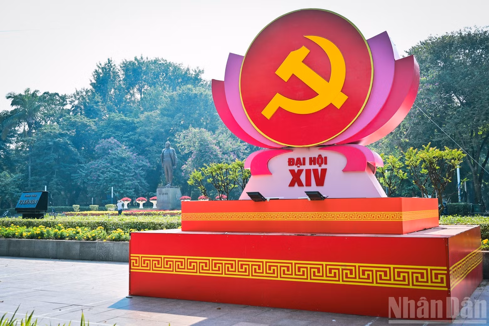 A large emblem of the 14th Party Congress stands in front of Lenin Park Square.