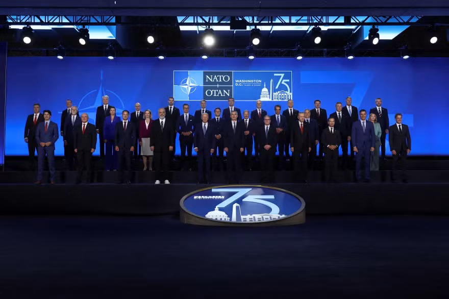 NATO Secretary General Jens Stoltenberg, US President Joe Biden, Britain's Prime Minister Keir Starmer, German Chancellor Olaf Scholz, France's President Emmanuel Macron, Canadian Prime Minister Justin Trudeau, Italy's Prime Minister Giorgia Meloni, Spanish Prime Minister Pedro Sanchez, Hungary's Prime Minister Viktor Orban, Slovakia's President Peter Pellegrini, Greek Prime Minister Kiriakos Mitsotakis, and Albania's Prime Minister Edi Rama stand together as they attend NATO's 75th anniversary summit in Washington, US, July 10, 2024. (Photo: REUTERS)