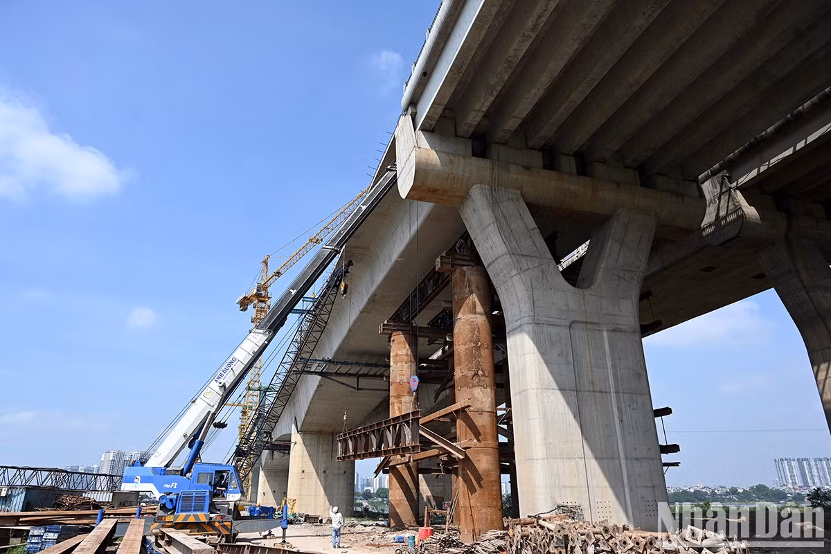 Working on structural connections of the bridge.