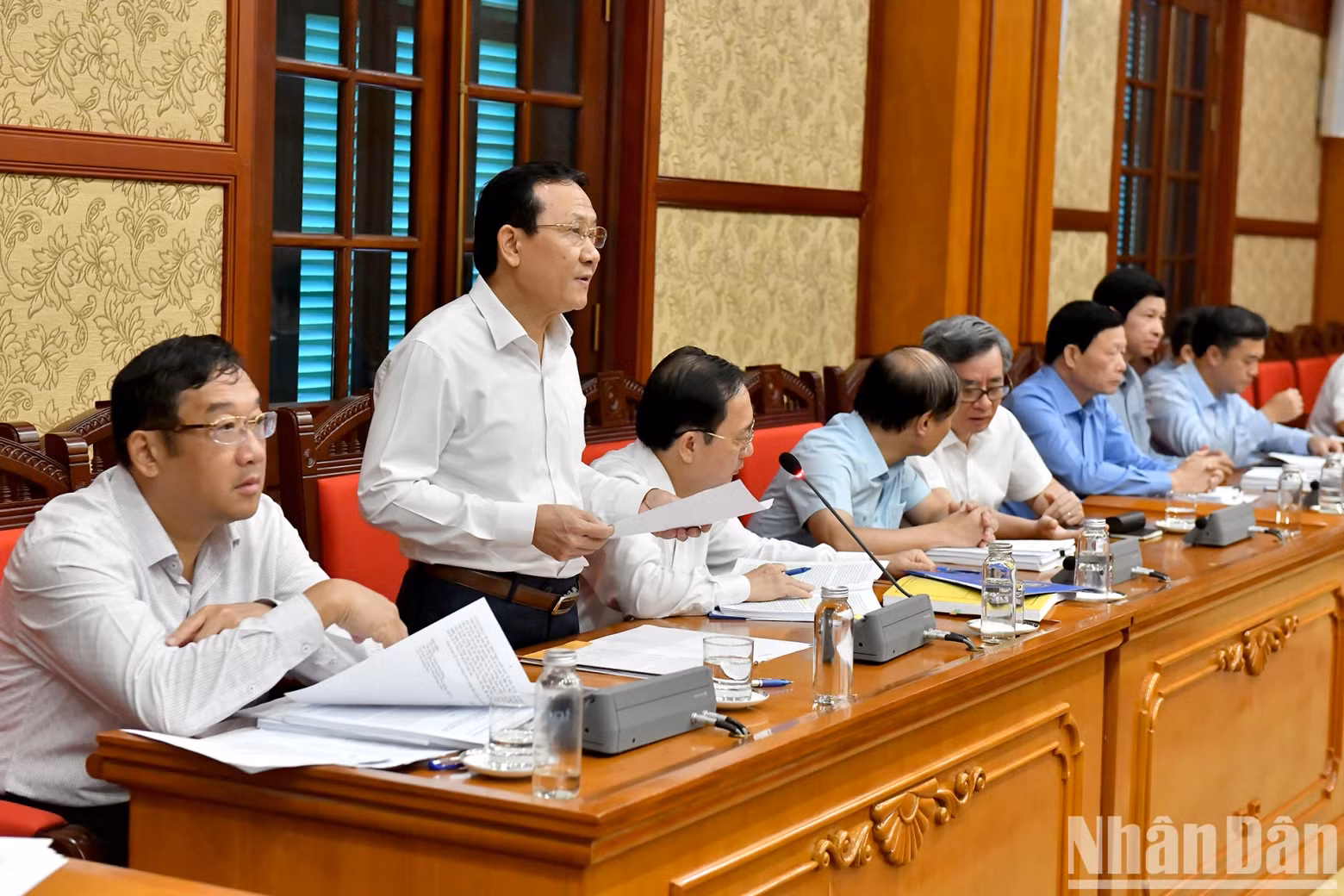 Delegates attend the meeting.