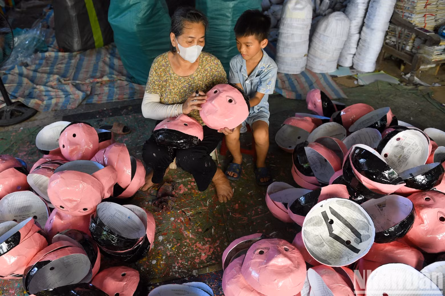 Papier-mâché masks are colourful yet simple, reflecting the traditional essence of Mid-Autumn Festival toys.