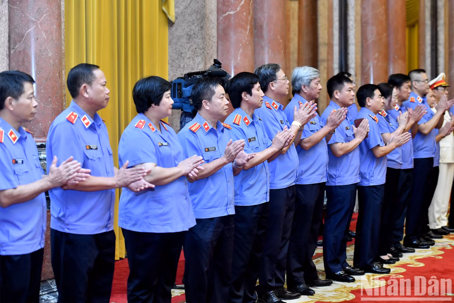 Delegates attend the ceremony.