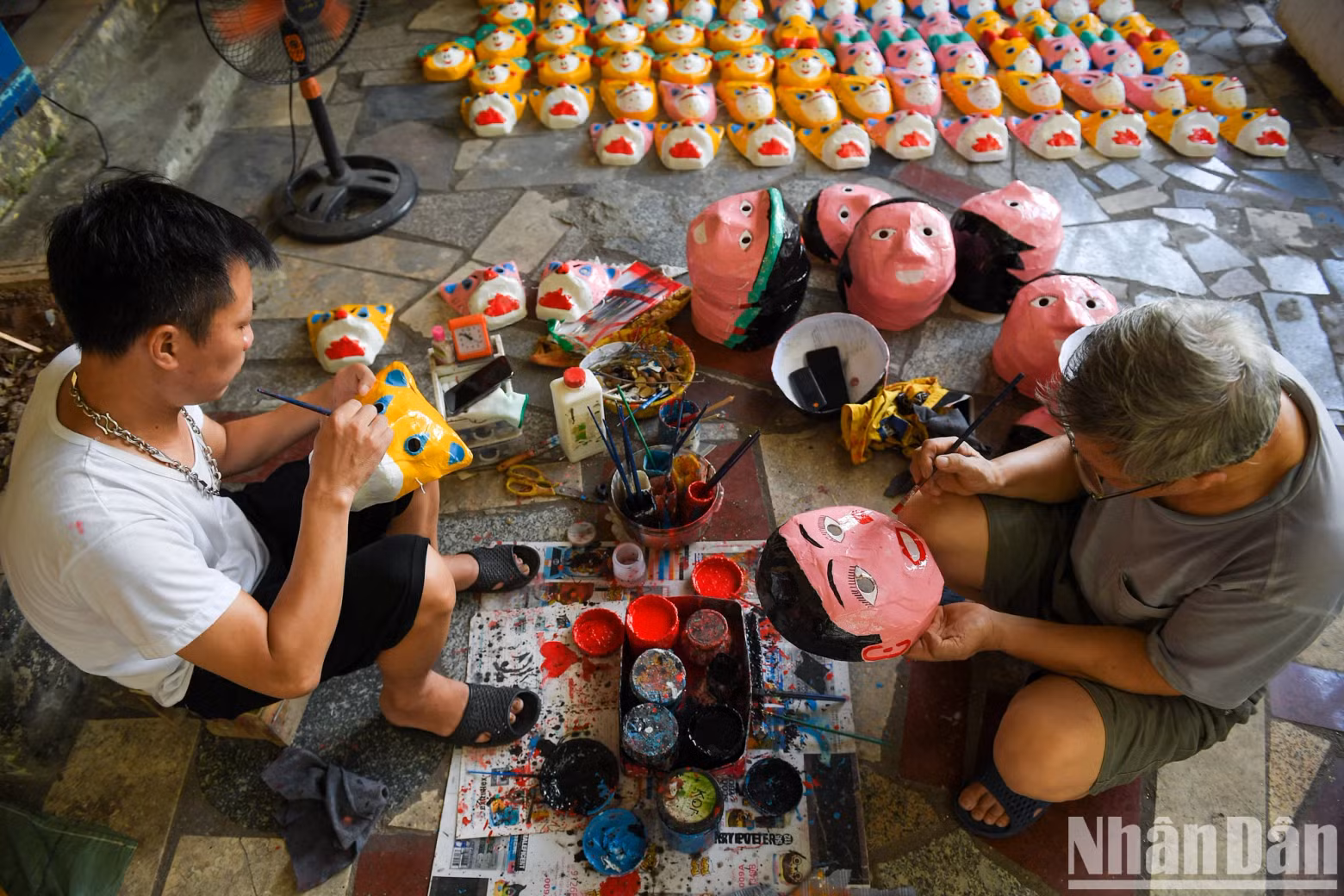 From simple masks, the villagers breathe life into them, turning them into toys that children love.