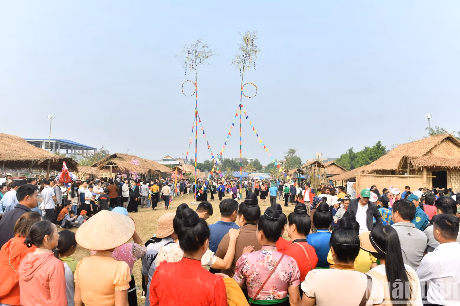 The 'con' (colourful fabric ball) throwing contest attracts many visitors and locals.