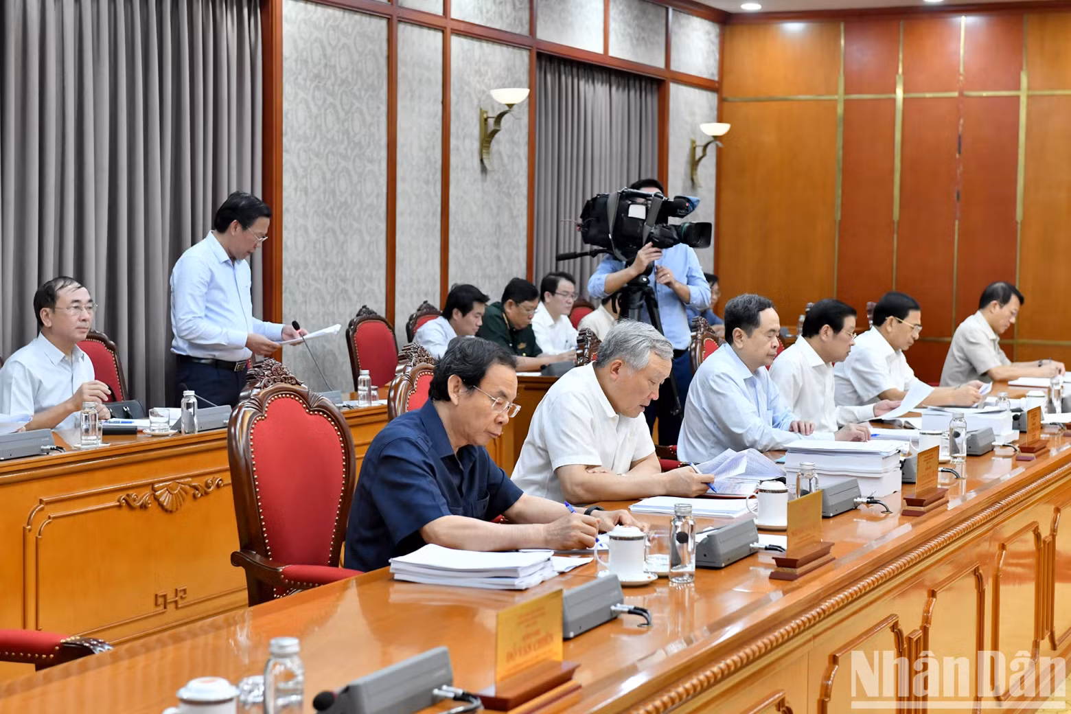 Party and State leaders and other delegates attend the meeting.
