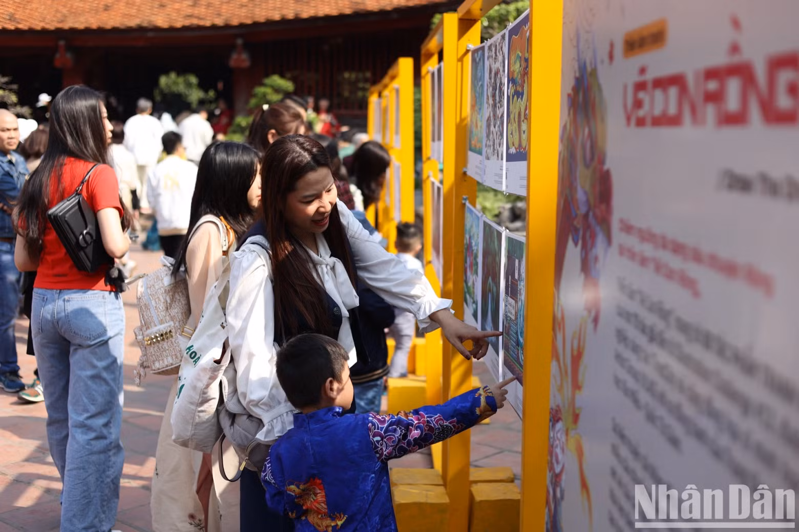 Inside the Temple of Literature, an exhibition features 80 illustrations of dragons by more than 75 artists.