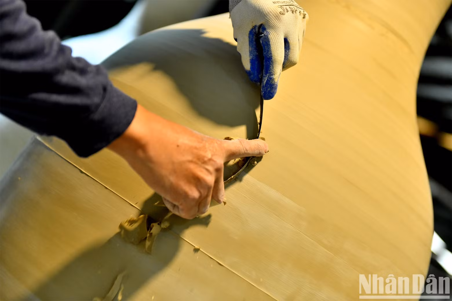 The skilful hands of workers are creating ceramic cores. The skilful hands of workers are creating ceramic cores.