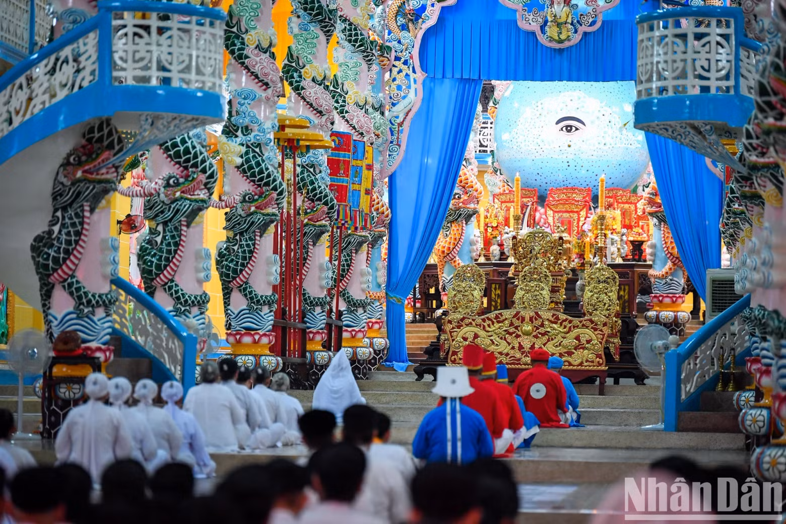 These rows of pillars divide the main hall into nine compartments. This is the praying area for each level of followers. When the worshiping ceremony takes place, the dignitaries and followers will each have a separate position corresponding to their rank in Cao Dai religion. The ceiling has the painted image of stars and clouds symbolising the heavens. These rows of pillars divide the main hall into nine compartments. This is the praying area for each level of followers. When the worshiping ceremony takes place, the dignitaries and followers will each have a separate position corresponding to their rank in Cao Dai religion. The ceiling has the painted image of stars and clouds symbolising the heavens.