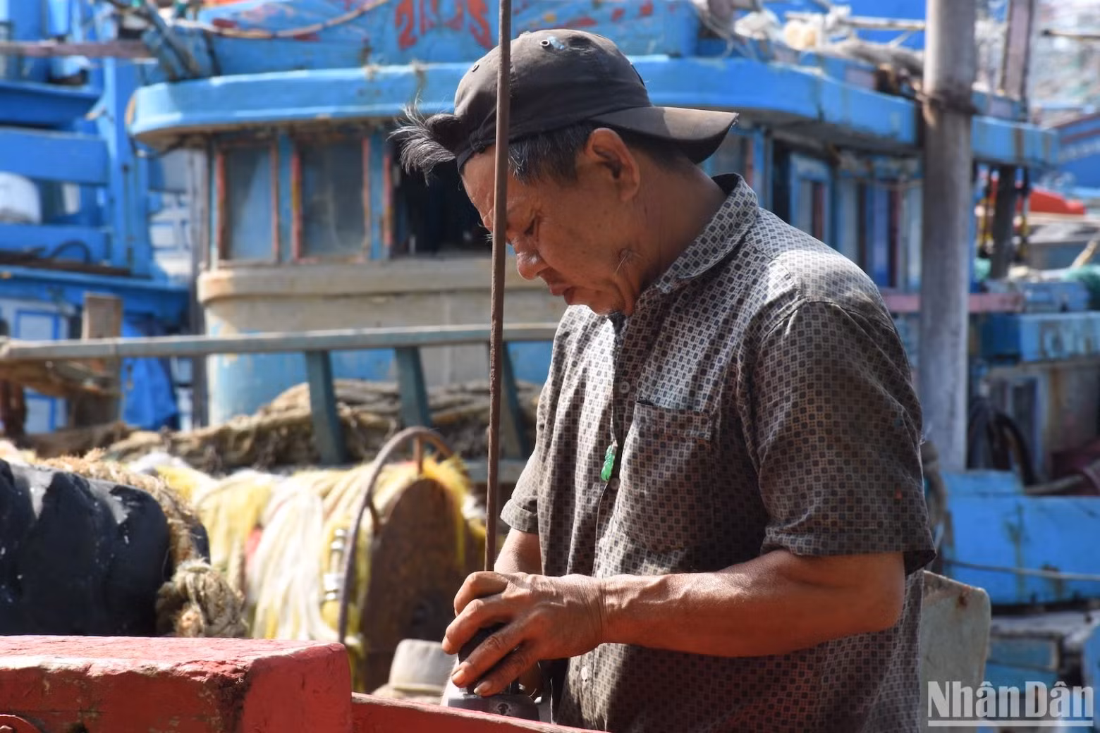 Technical parts on the fishing vessel are checked carefully.