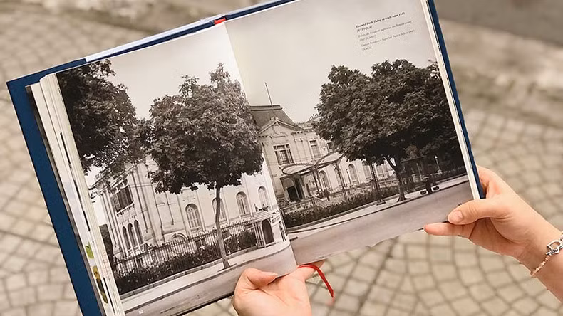 The book provides beautiful documentary photos from the early 20th century of the architectural works.