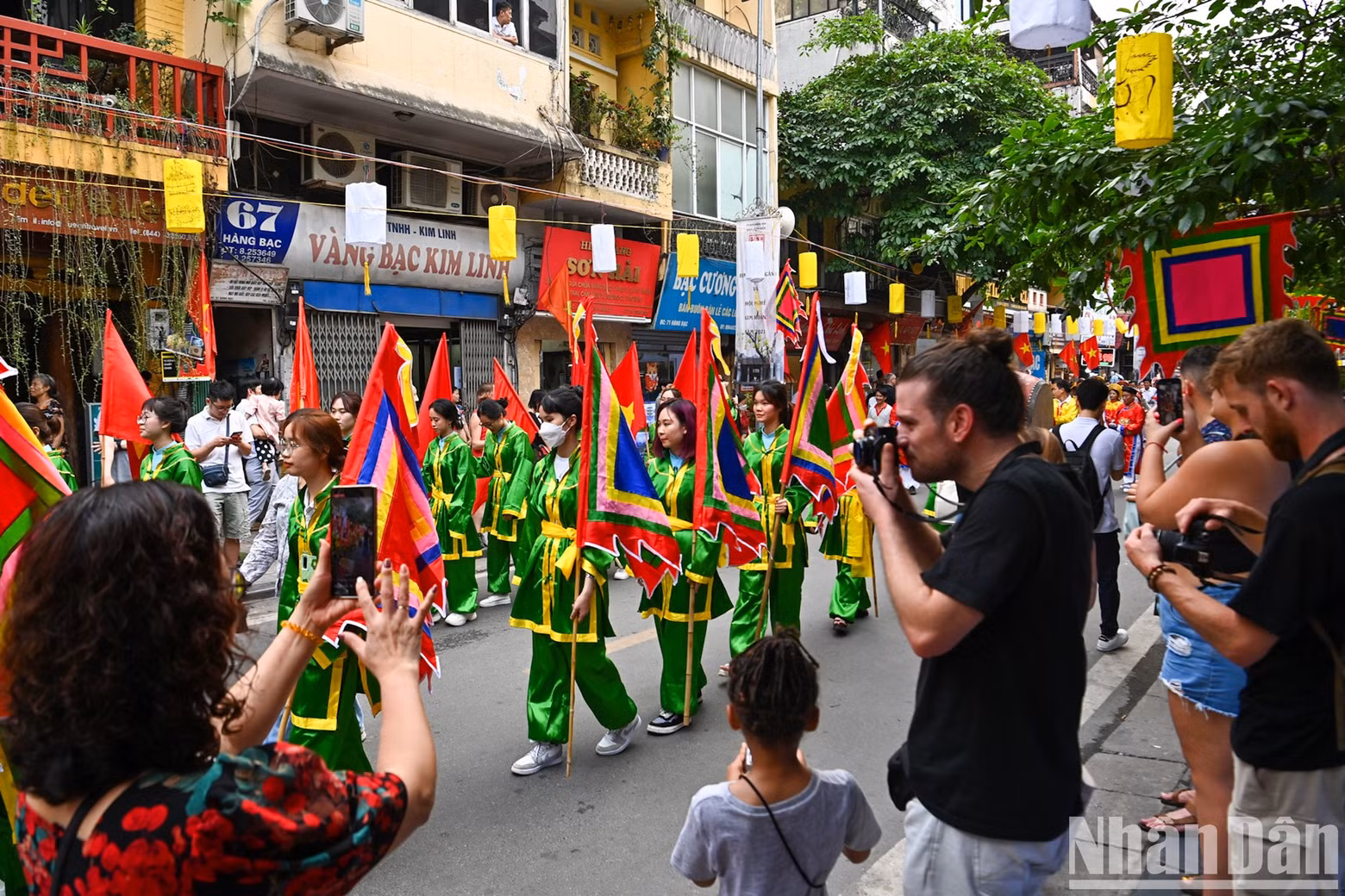 Residents and visitors admire the traditional cultural performances that are imbued with folk colours.
