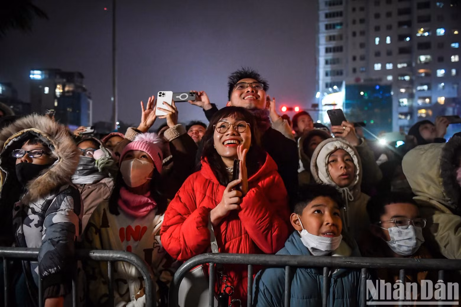 People admire every moment of this impressive light art performance.