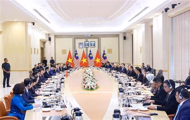 At the talks between the two PMs in Kuala Lumpur on May 25 (Photo: VNA) At the talks between the two PMs in Kuala Lumpur on May 25 (Photo: VNA)