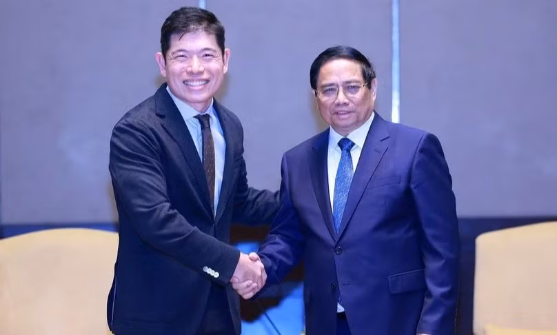 PM Pham Minh Chinh and Anthony Tan, Chief Executive Officer and Co-founder of Grab, at their meeting in Kuala Lumpur on May 25 (Photo: VNA)