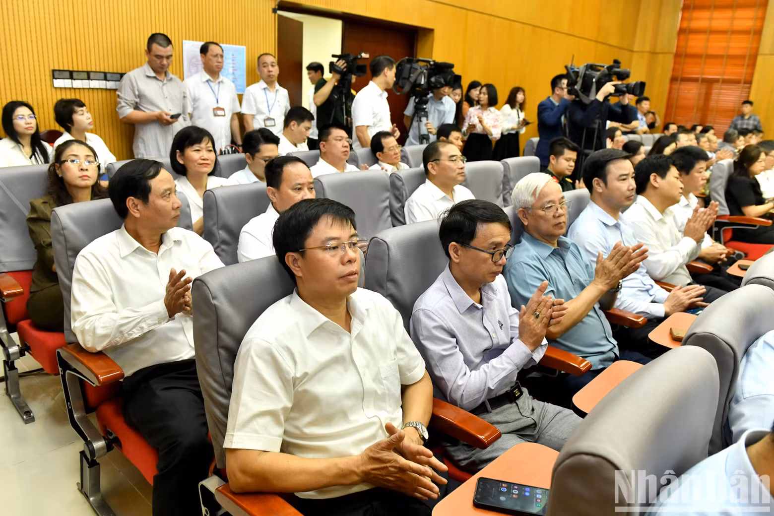 The delegates and voters attend the meeting.