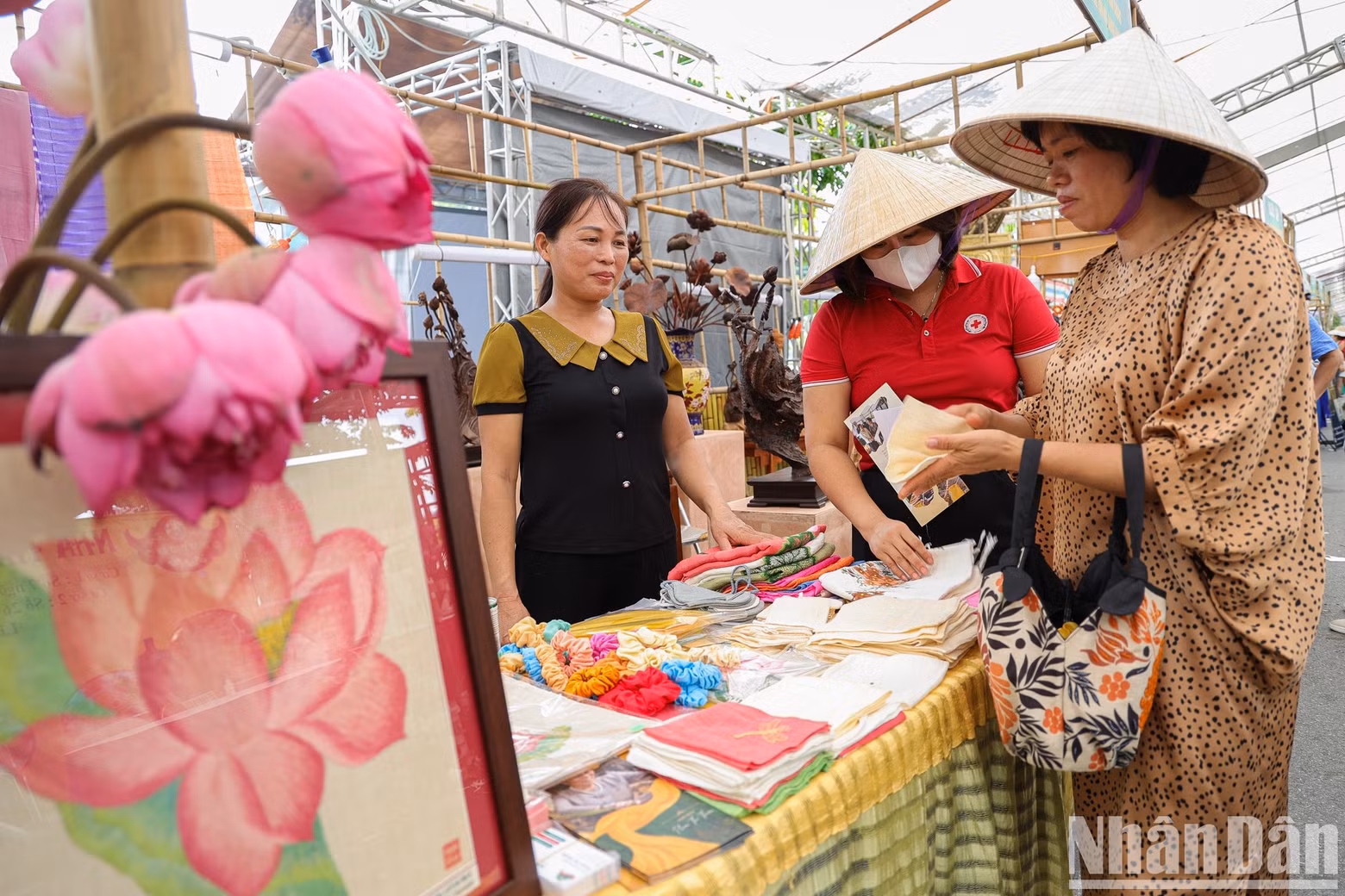 A booth showcasing scarves made from lotus silk.