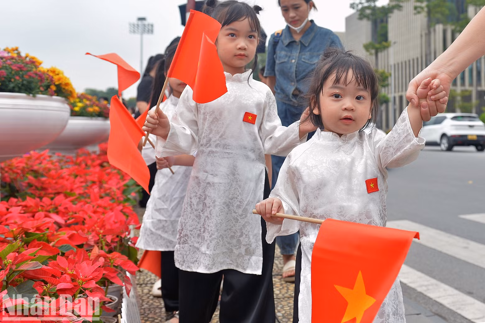 Many kids are taken by their parents and teachers to the area around President Ho Chi Minh Mausoleum to celebrate National Day.