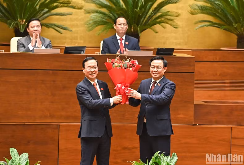 National Assembly Chairman Vuong Dinh Hue (R) congratulates newly-elected President Vo Van Thuong. National Assembly Chairman Vuong Dinh Hue (R) congratulates newly-elected President Vo Van Thuong.