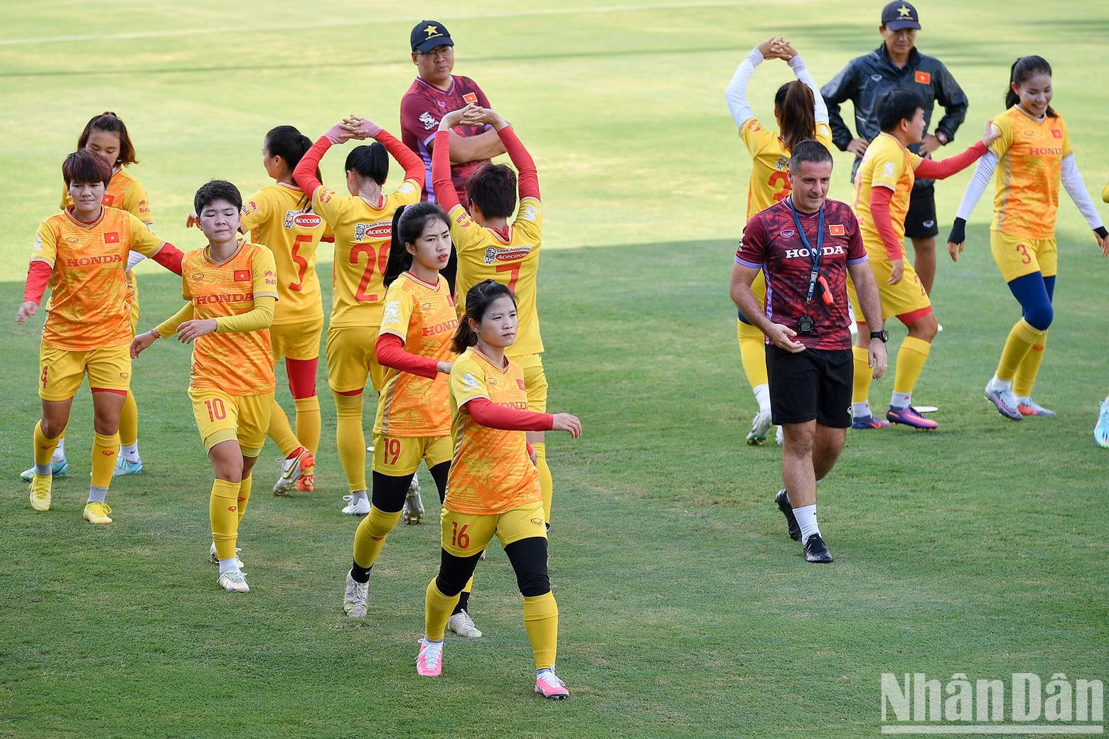 Warming up under the instruction of fitness coach Cedric Roger.