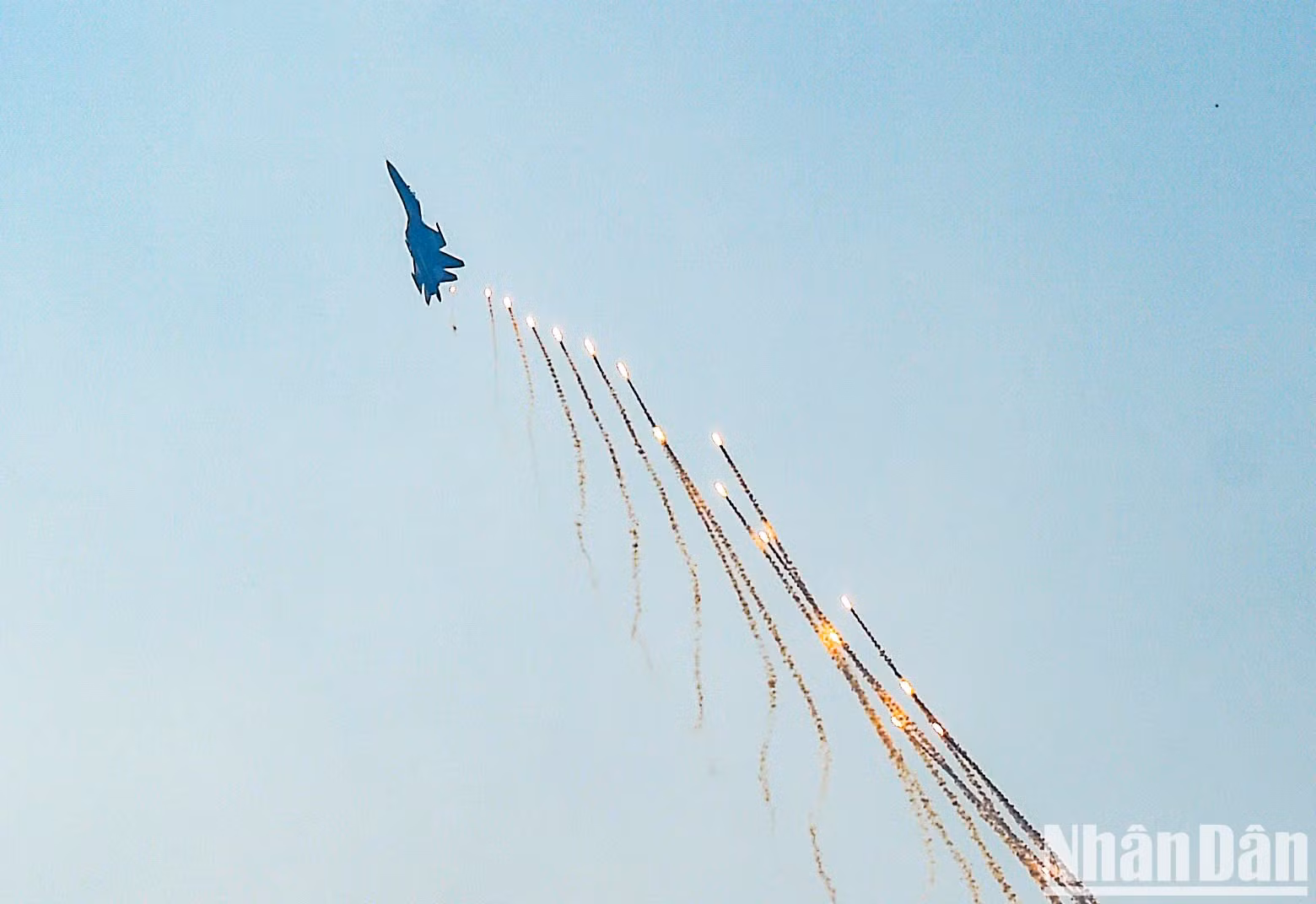 Su-30MK2 fighter jets fire flares in air show above central Ho Chi Minh City