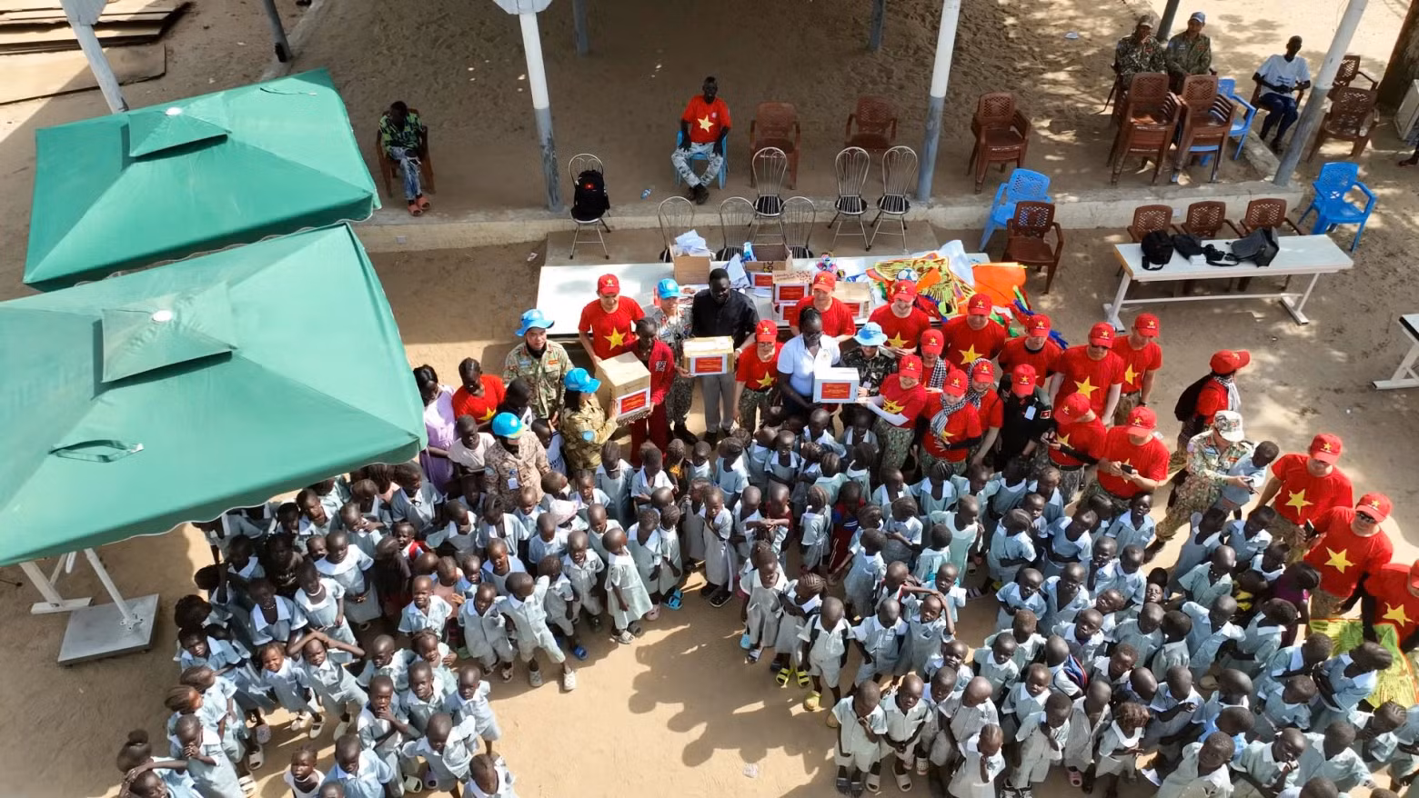 Abyei children gather with Vietnamese soldiers to celebrate International Children’s Day.