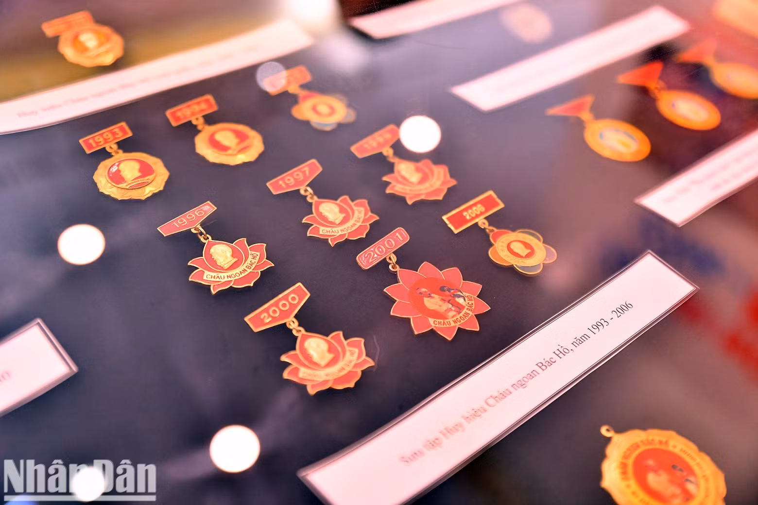 A collection of Uncle Ho’s Good Children badges from various historical periods draws significant interest.