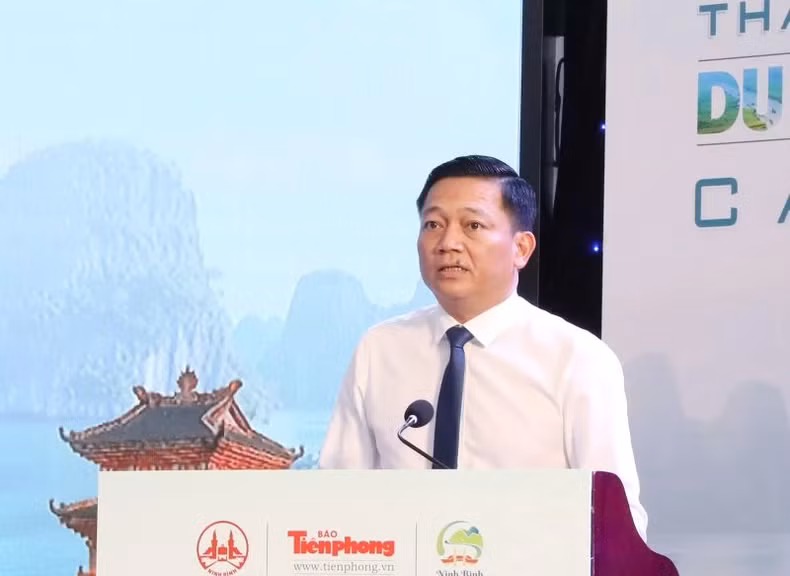 Vice Chairman Nguyen Cao Son delivers remarks at the seminar. (Photo: DUC PHUONG)