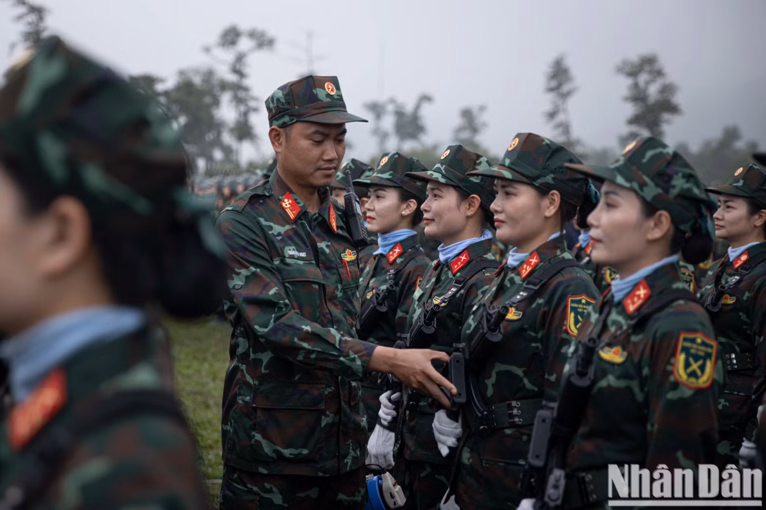 The Vietnamese female peacekeeping forces prepare to participate in the rehearsal.
