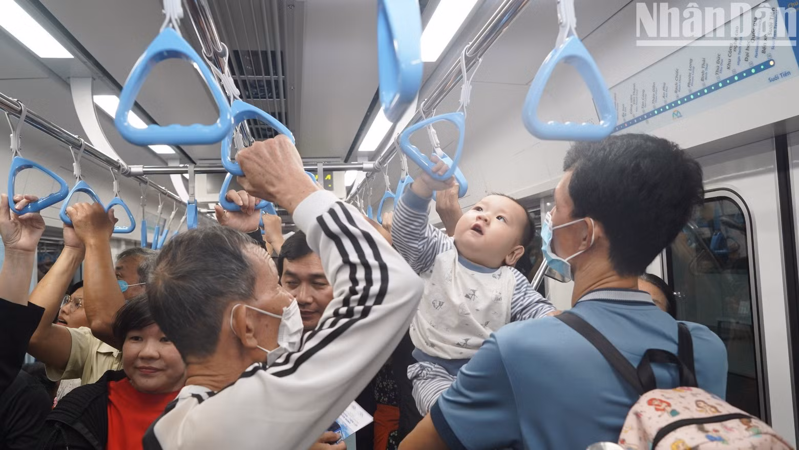 The metro trains are packed with people on the first day of opening.