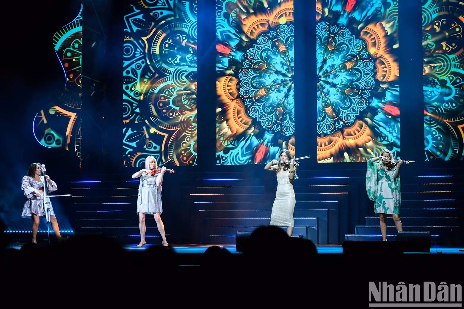 Graphics in the background make the performance more spirited.