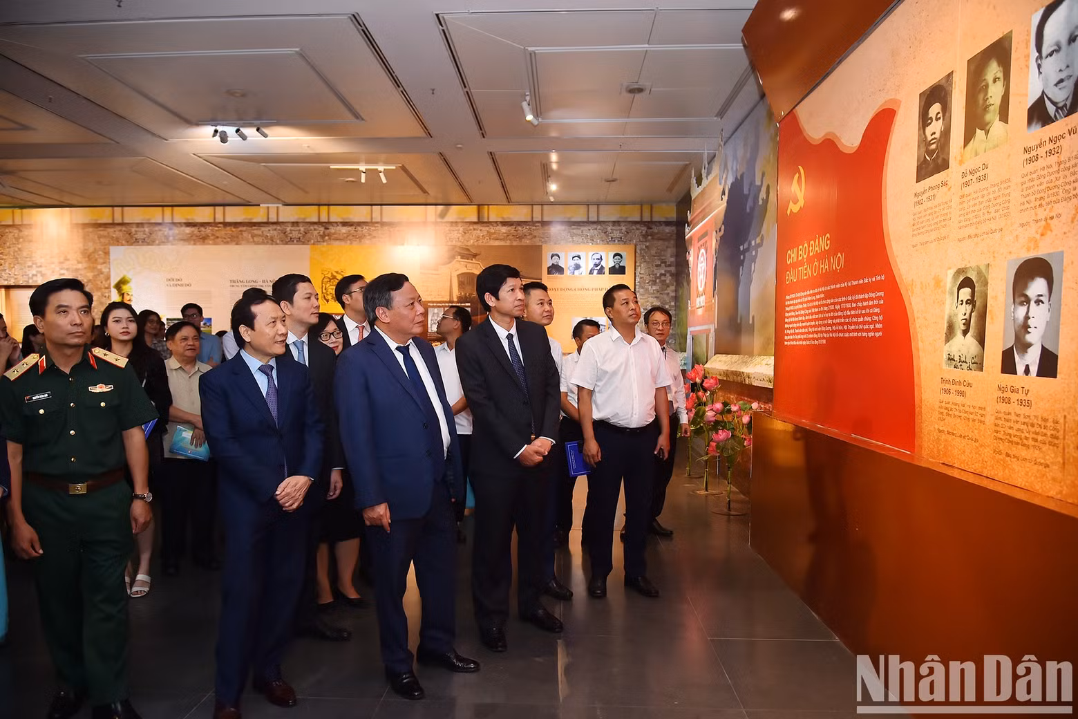 Delegates visit an exhibition space on the first Party cell in Hanoi.
