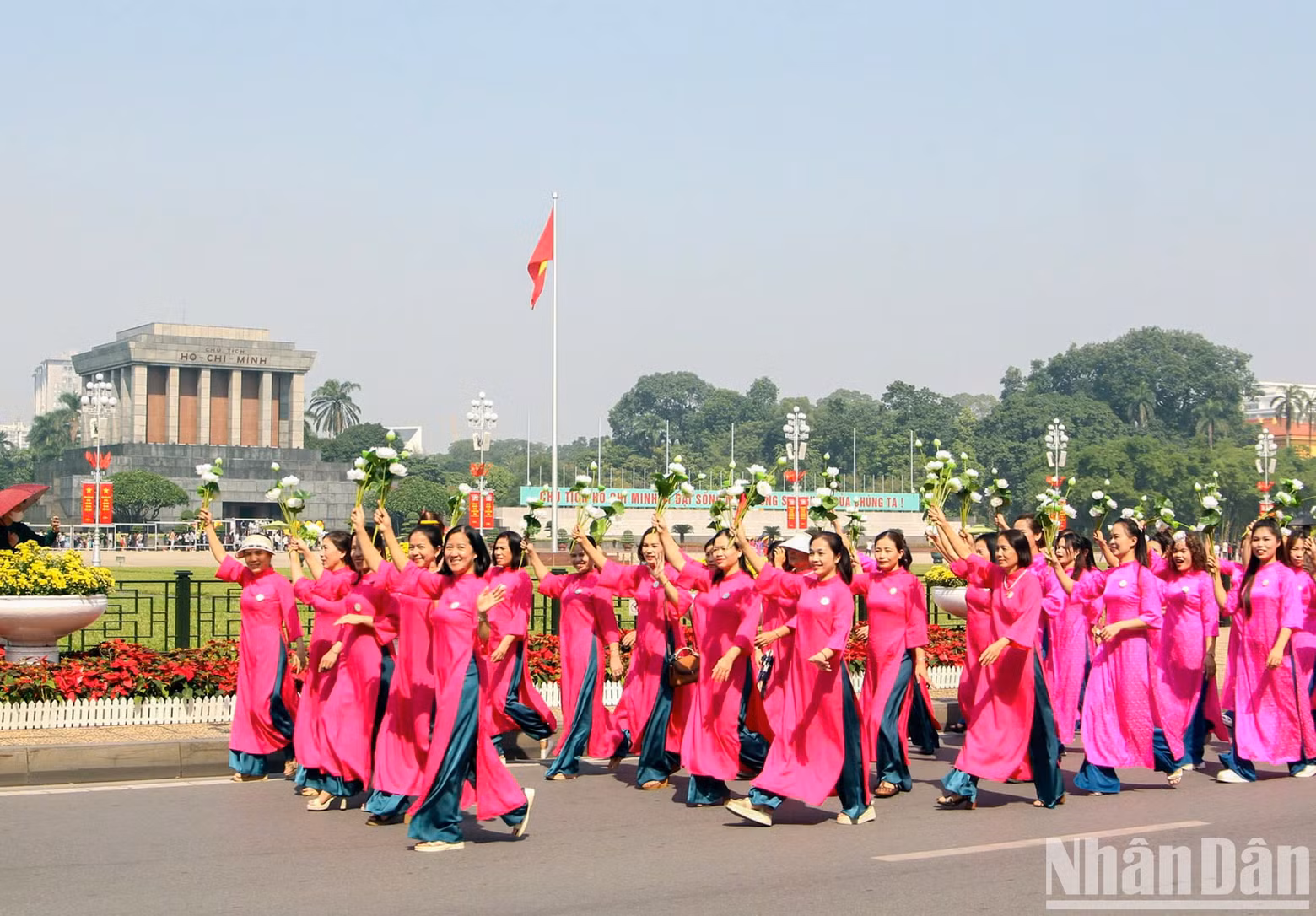 The delegates march past President Ho Chi Minh’s Mausoleum.