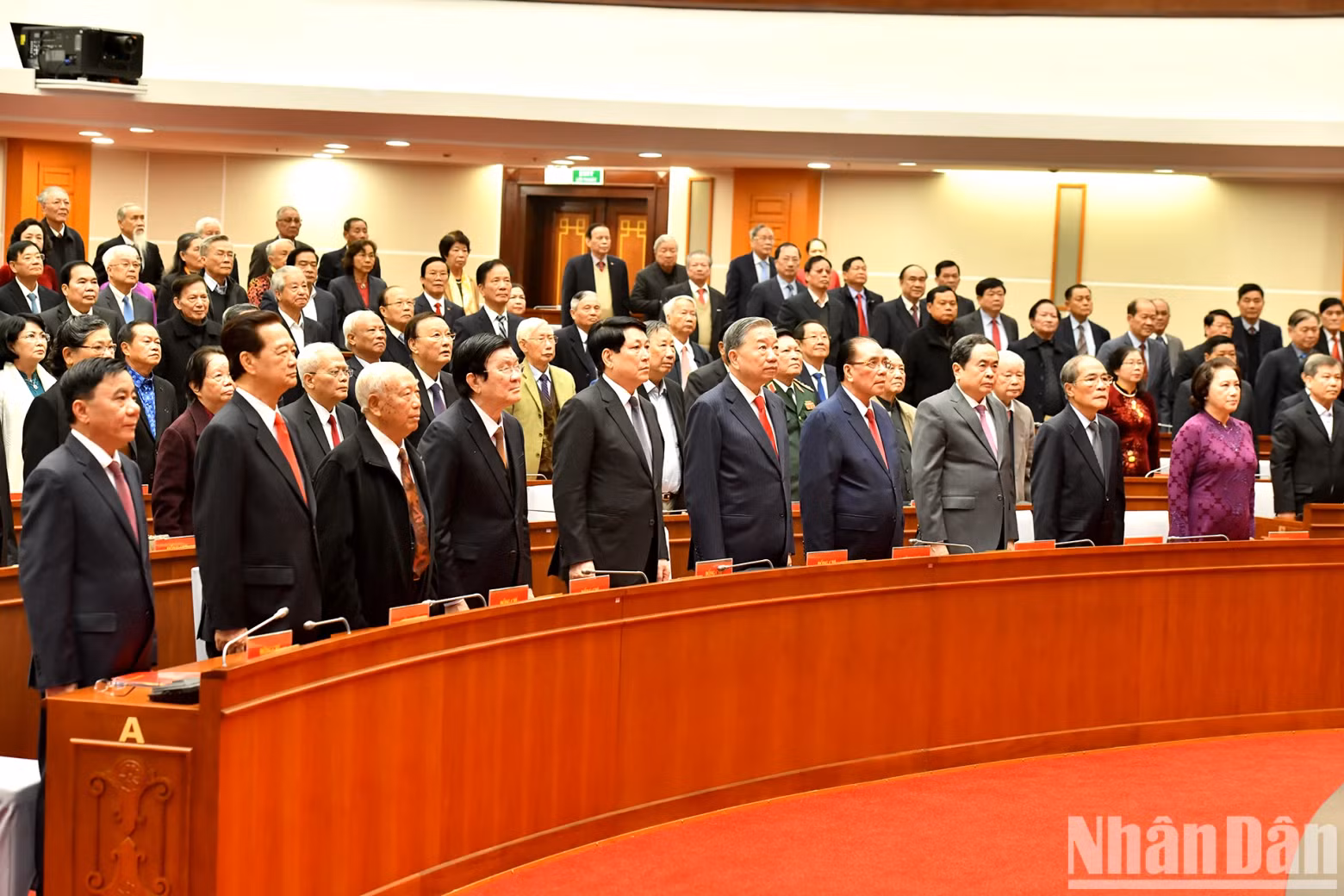 Leaders and former leaders of the Party and the State perform the flag-saluting ceremony