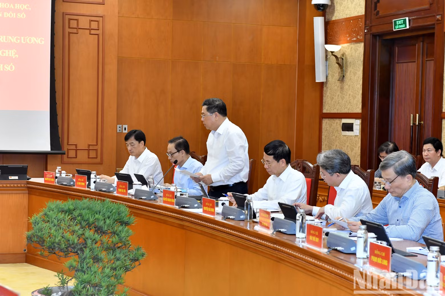 Delegates attend the meeting.