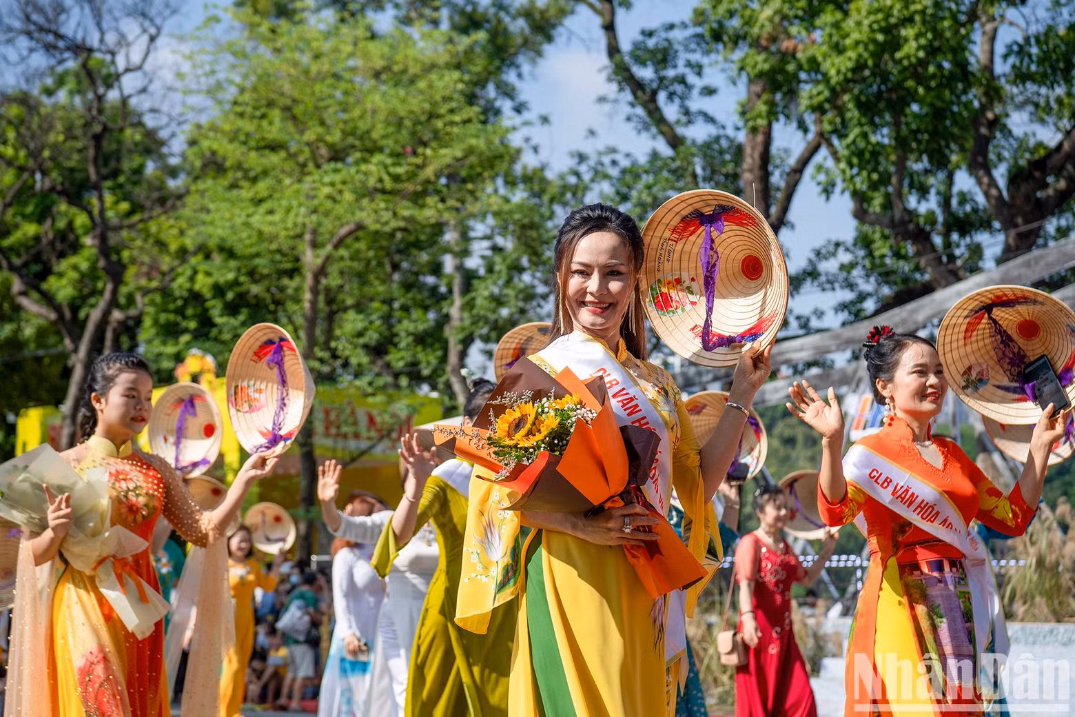 A parade by the Vietnam Ao dai Cultural Club.