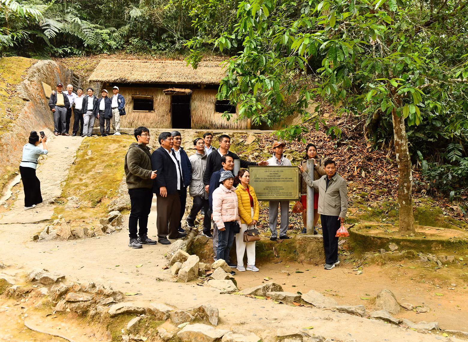 Tourists visit General Vo Nguyen Giap’s living and working shack at the headquarters of the Dien Bien Phu Campaign.