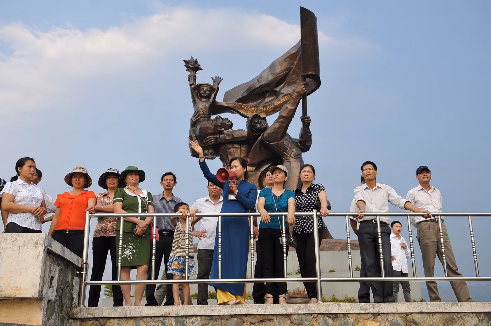 Tourists take a panoramic view of Dien Bien Phu City from the Dien Bien Phu Victory Monument.